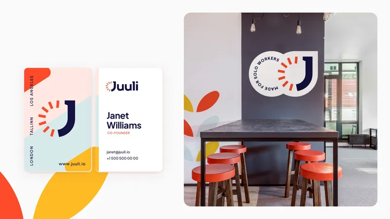 Juuli co-founder business card next to a café wall with the “Made for solo workers” badge