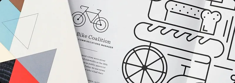 Printed stationery with line illustrations of a bicycle and a bakery for the Bike Coalition