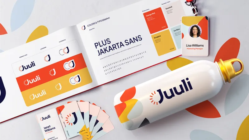 Juuli brand identity applied to stationery, bottle and app screens