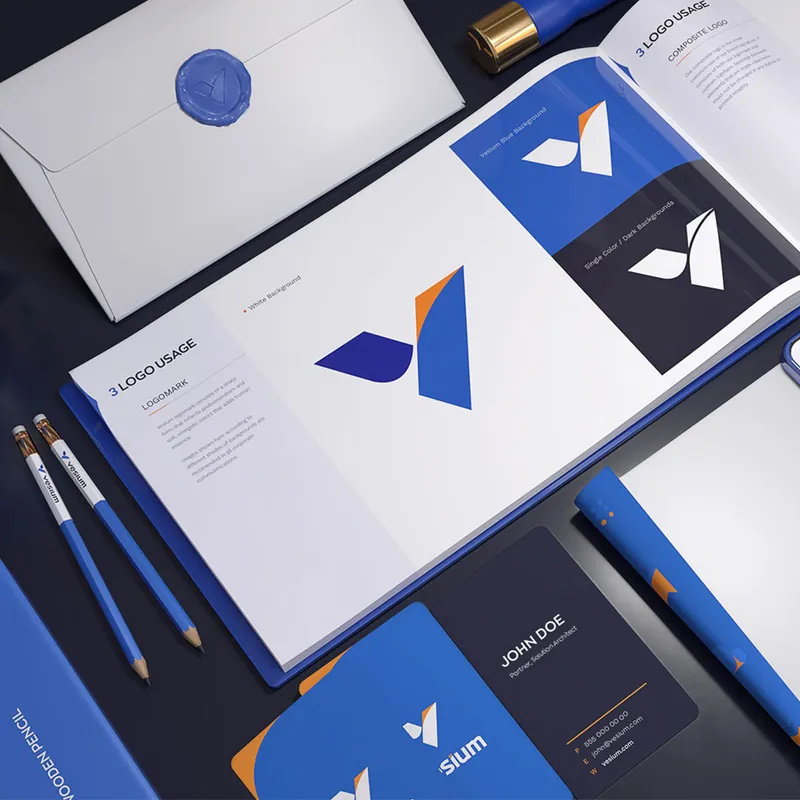 Vesium stationery, letterhead and business cards in blue and white with pens